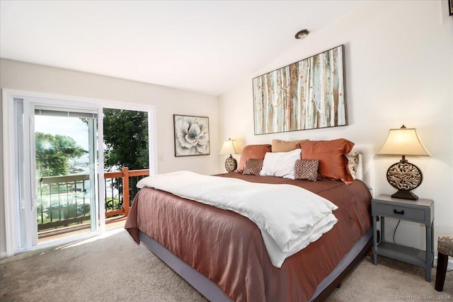 bedroom featuring light carpet and access to outside