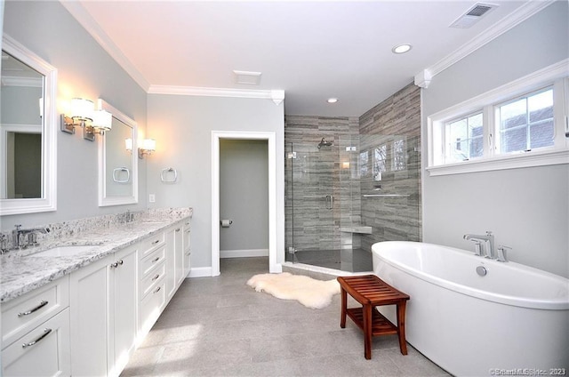 bathroom featuring independent shower and bath, tile patterned floors, crown molding, and double vanity