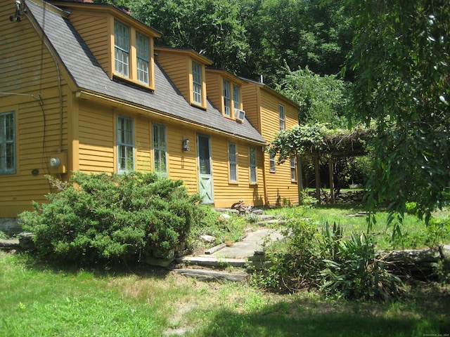 view of property exterior with cooling unit