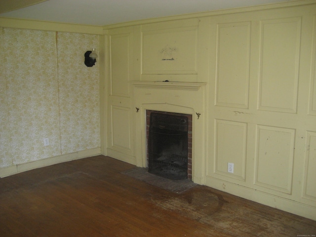 unfurnished living room with dark hardwood / wood-style flooring