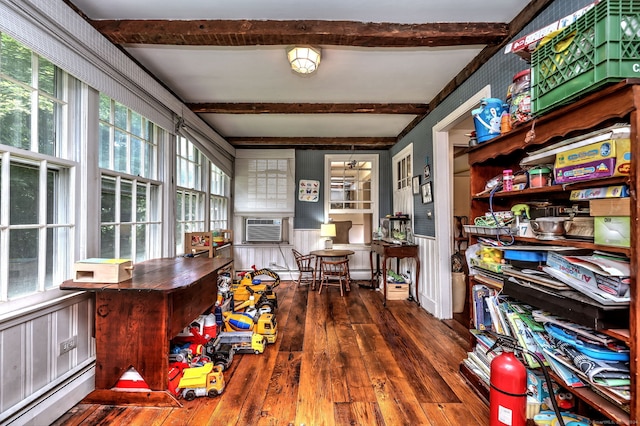 office featuring a baseboard radiator, beam ceiling, cooling unit, and dark wood-type flooring