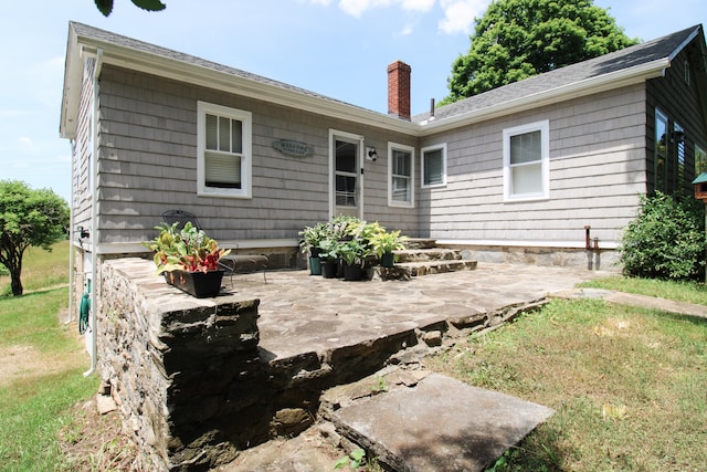 back of house featuring a patio area