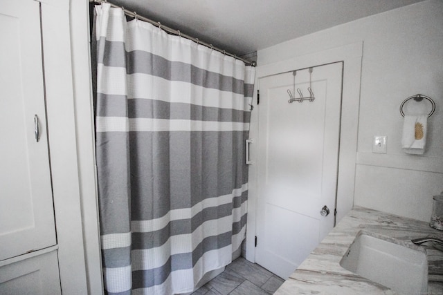 bathroom featuring sink and tile patterned floors