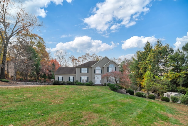 view of front of home with a front yard