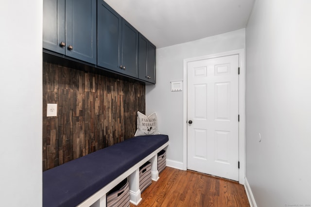 mudroom with dark hardwood / wood-style floors