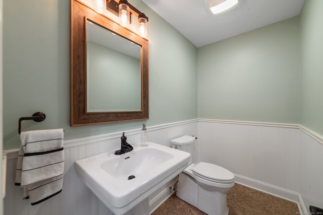 bathroom with toilet and sink