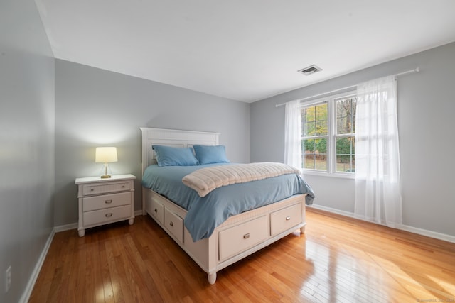 bedroom featuring light hardwood / wood-style floors