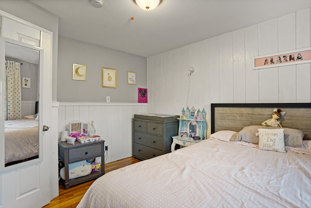 bedroom featuring wood finished floors