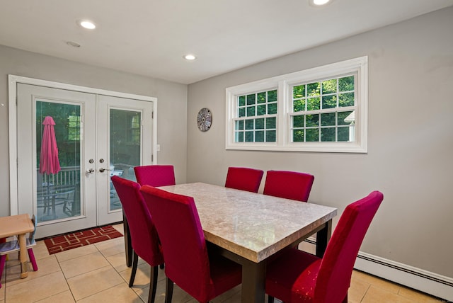 dining space featuring recessed lighting, a baseboard radiator, and french doors