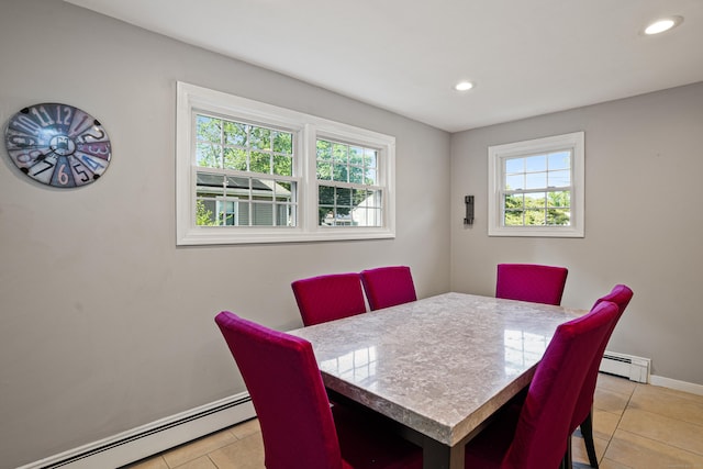 dining space with baseboards, a baseboard radiator, light tile patterned flooring, and recessed lighting