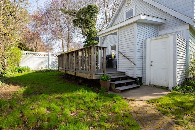 view of yard with a wooden deck