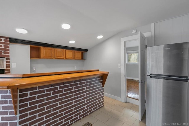 kitchen with stainless steel fridge