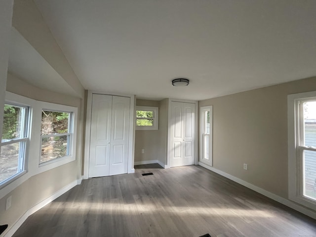 spare room featuring hardwood / wood-style flooring