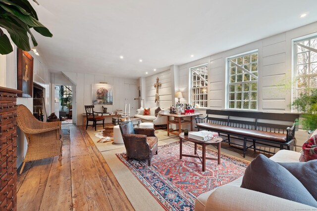 155 Joshuatown Rd, Lyme, CT 06371 - living room with wood-type flooring, a decorative wall, and recessed lighting