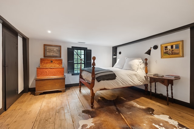 bedroom with light wood-type flooring