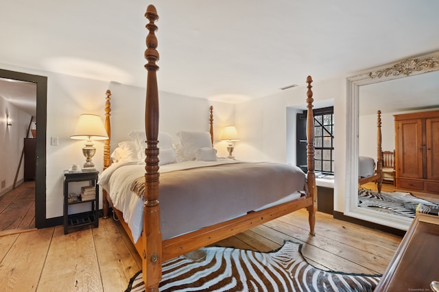 bedroom featuring light wood-type flooring