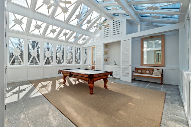 game room with sink, beamed ceiling, high vaulted ceiling, and pool table