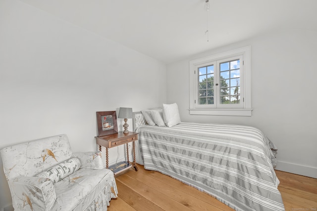 bedroom with light wood-type flooring