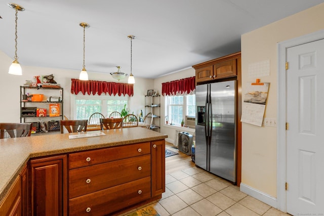46 Nedobity Rd, Haddam, CT 06441 - kitchen featuring stainless steel fridge with ice dispenser, pendant lighting, light countertops, and light tile patterned floors
