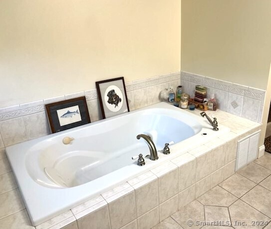46 Nedobity Rd, Haddam, CT 06441 - full bath with a garden tub and tile patterned floors