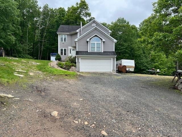 46 Nedobity Rd, Haddam, CT 06441 - view of front of home with a garage and dirt driveway
