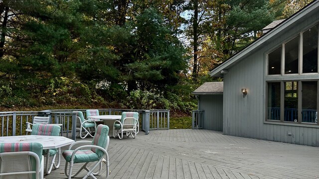 162 Pequot Trl, Stonington, CT 06379 - wooden terrace featuring outdoor dining area