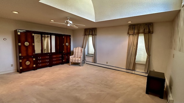 unfurnished bedroom with baseboards, ceiling fan, carpet flooring, recessed lighting, and a baseboard radiator