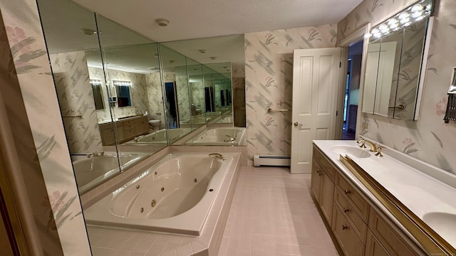 bathroom featuring a sink, a jetted tub, wallpapered walls, double vanity, and a baseboard radiator