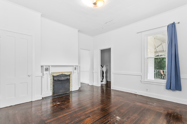 unfurnished living room with crown molding, hardwood / wood-style floors, and a high end fireplace