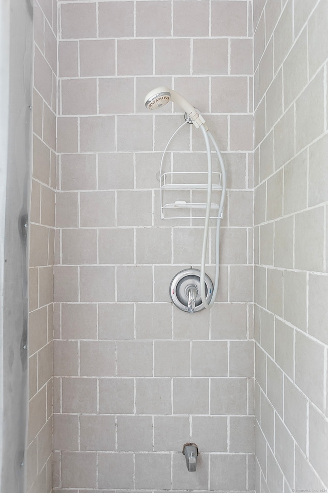 interior space with a tile shower