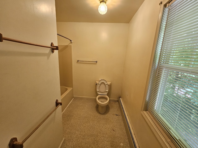 bathroom with toilet and baseboard heating