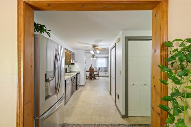 kitchen with ceiling fan, appliances with stainless steel finishes, and exhaust hood