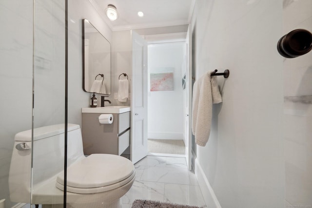 bathroom with marble finish floors, ornamental molding, toilet, baseboards, and vanity