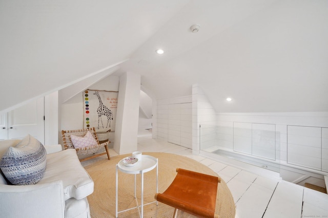 bonus room featuring vaulted ceiling, recessed lighting, and tile patterned flooring