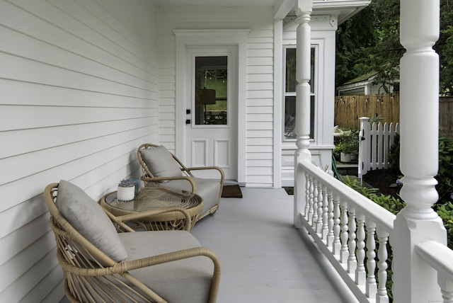balcony featuring covered porch