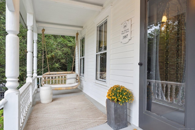 view of patio featuring a porch