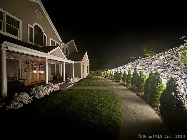 view of yard at twilight