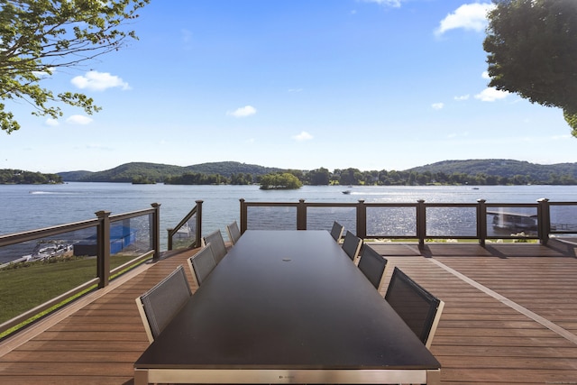 dock area featuring a water and mountain view