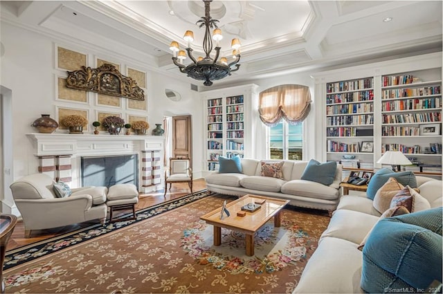 living room with an inviting chandelier, built in shelves, coffered ceiling, hardwood / wood-style flooring, and ornamental molding