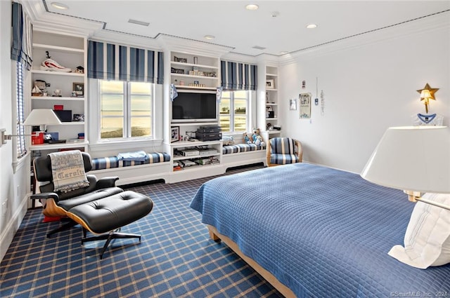 bedroom with carpet and crown molding