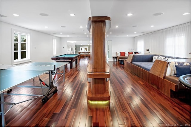 game room featuring decorative columns, billiards, and dark wood-type flooring