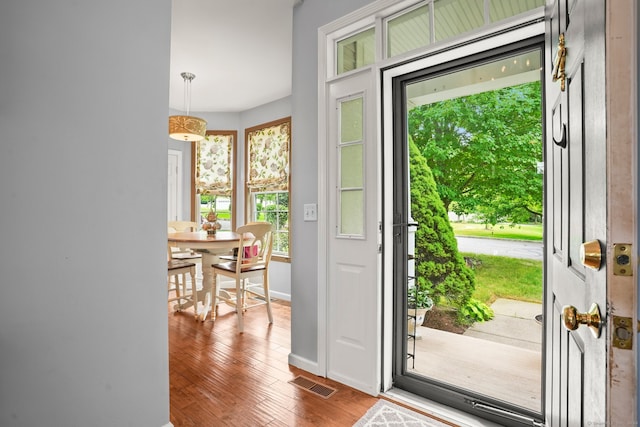 entrance foyer with hardwood / wood-style floors