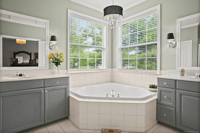 full bathroom featuring tile patterned flooring, two vanities, a sink, a bath, and crown molding