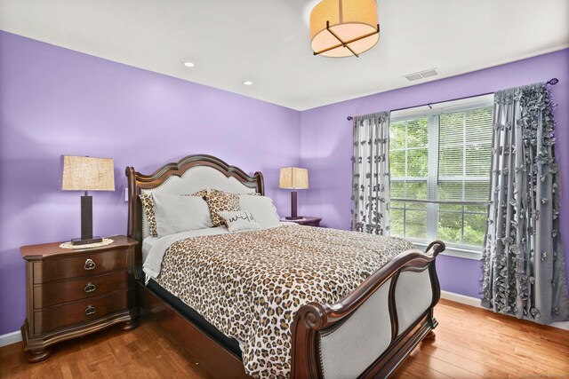 bedroom featuring hardwood / wood-style floors