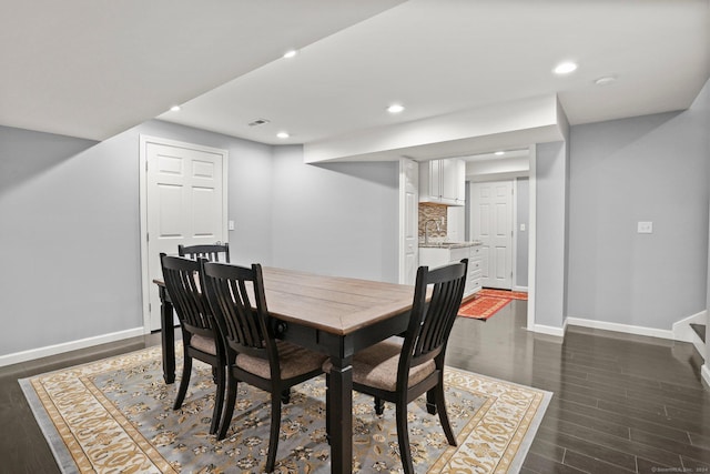 dining area with stairway, baseboards, dark wood-style flooring, and recessed lighting