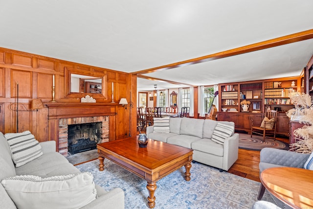 living room featuring hardwood / wood-style floors and a fireplace