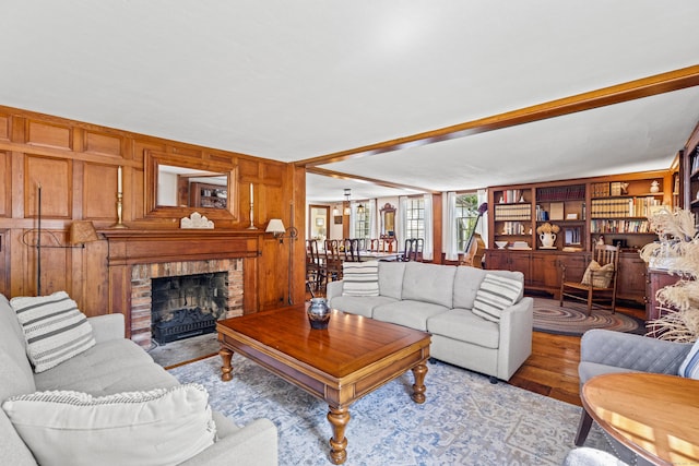 57 NW Corner Rd, Preston, CT 06365 - living room with a brick fireplace, wooden walls, and wood finished floors