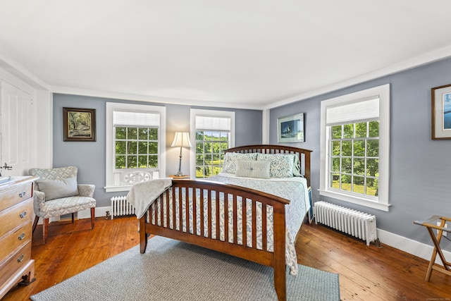 57 NW Corner Rd, Preston, CT 06365 - bedroom with hardwood / wood-style flooring, baseboards, and radiator