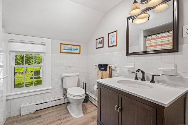 57 NW Corner Rd, Preston, CT 06365 - bathroom with vanity, toilet, tile walls, lofted ceiling, and a baseboard radiator