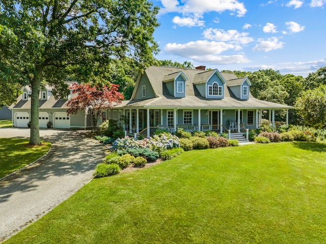 farmhouse-style home featuring a front lawn and covered porch